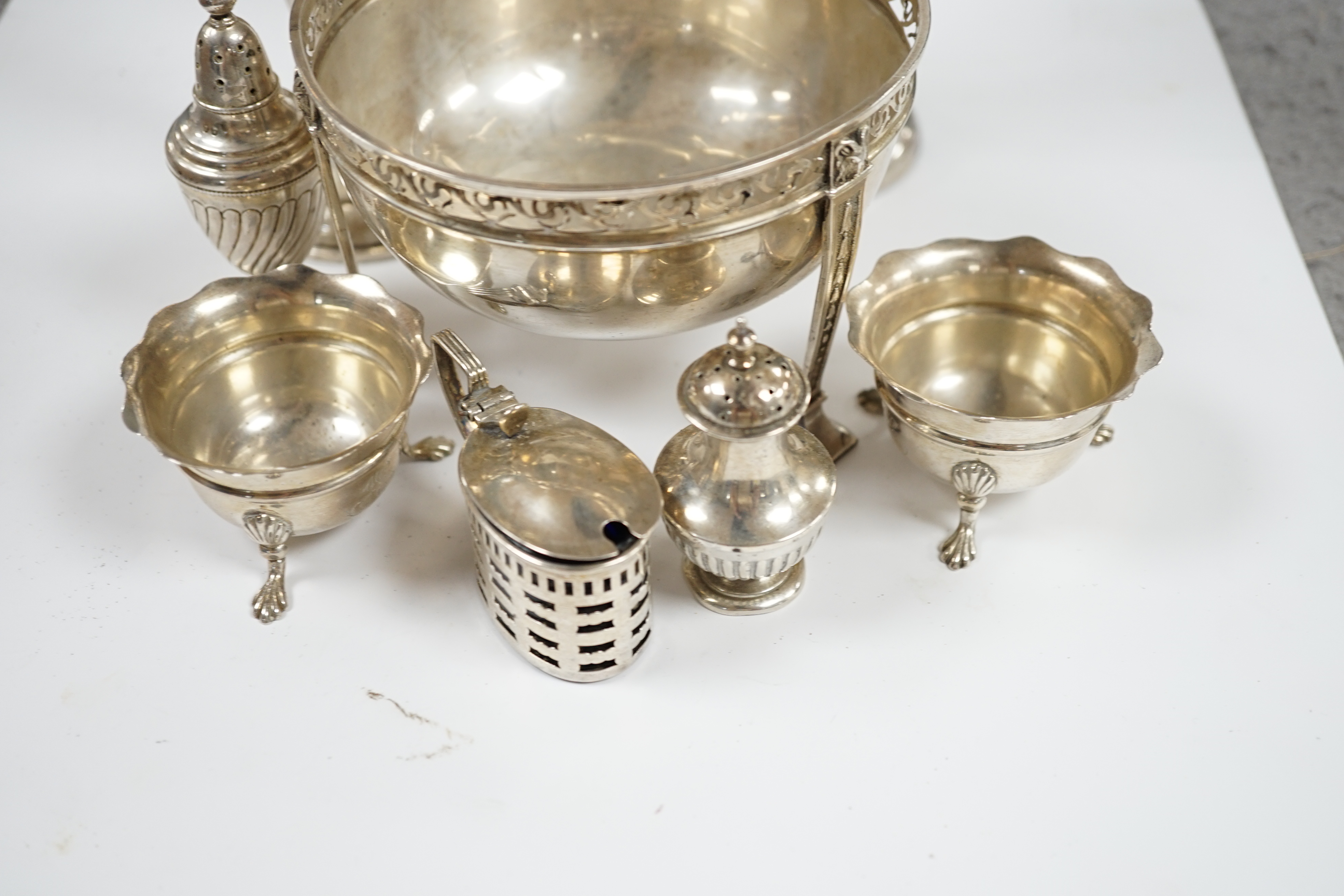 Three assorted silver mounted posy vases, tallest 20cm, five assorted silver condiments and a silver bowl. Condition - poor to fair